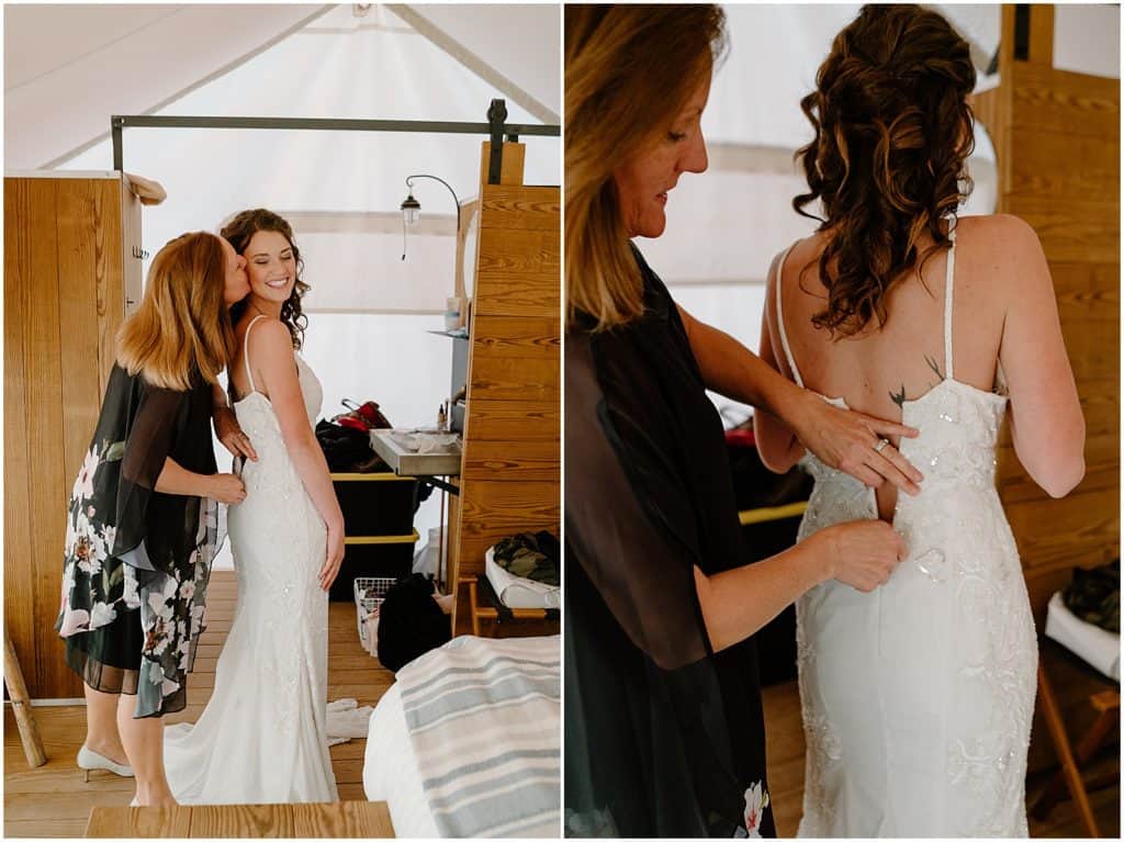 bride and mother of the bride helping her get ready