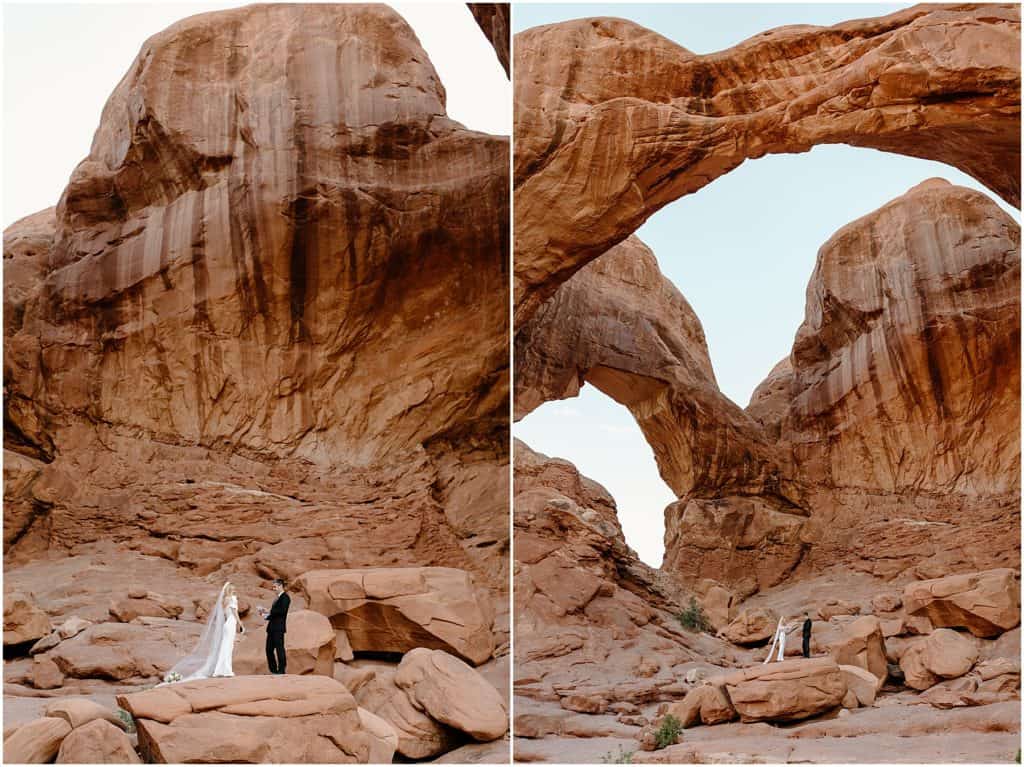 bride and groom in front of arch. on rock in moab for their elopement.

