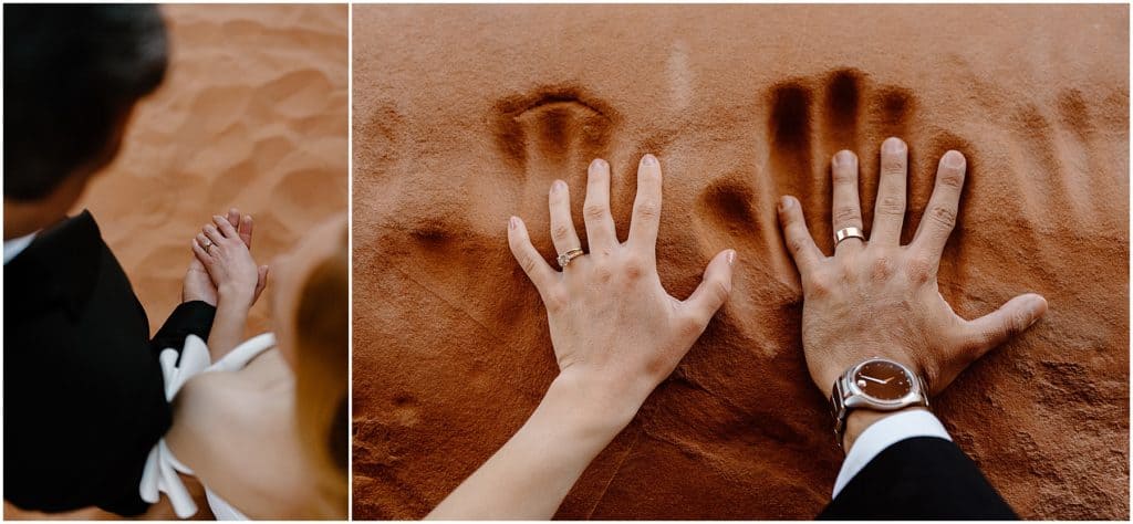 hands in sand with wedding rings on after moab elopement caremony.