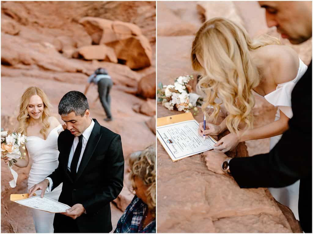 couple signing marriage license. with local hikers as witnesses after their moab elopement.