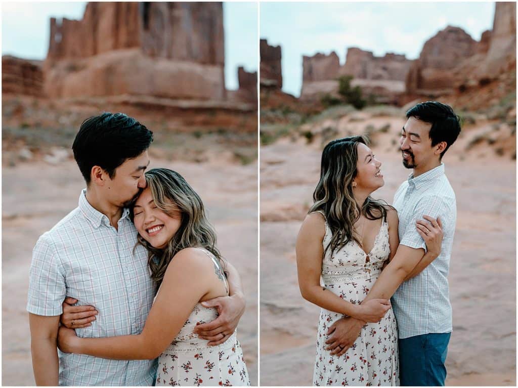 Couple seen in the front with the background blurry on their Arches National Park Adventure Session