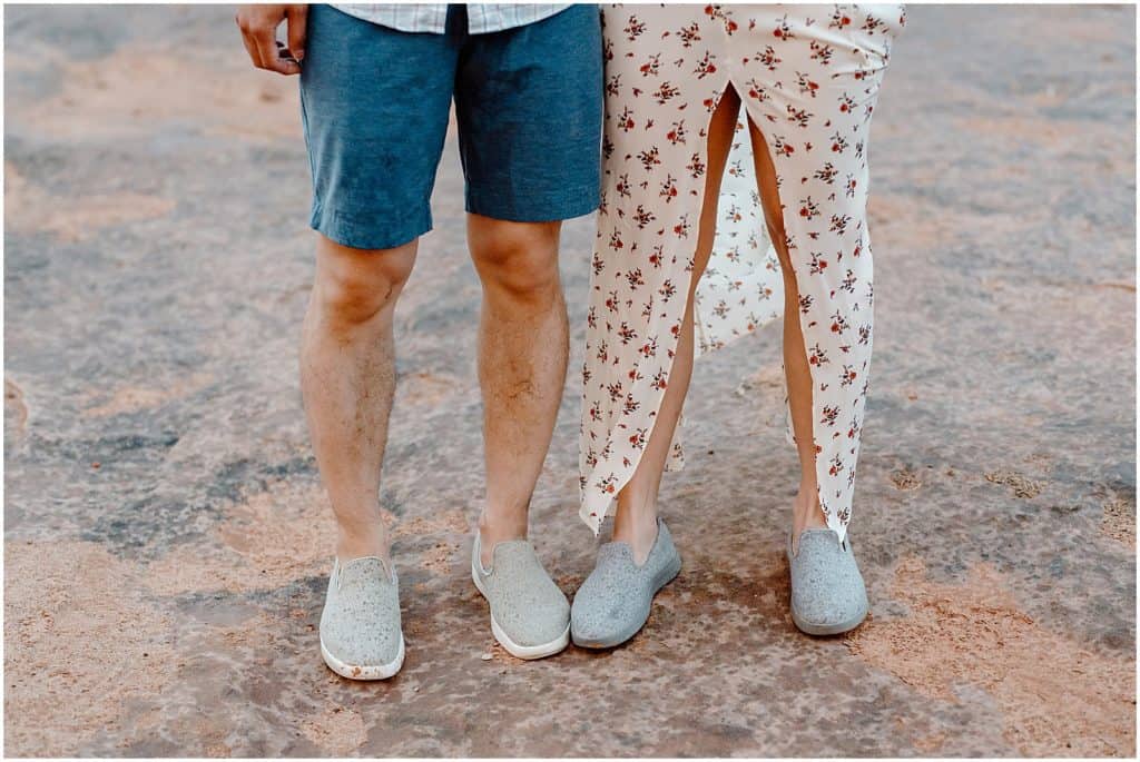 photo of couples matching grey shoes on their photoshoot