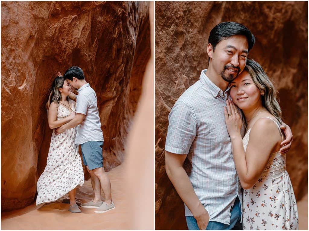 couple in front of rock wall in utah