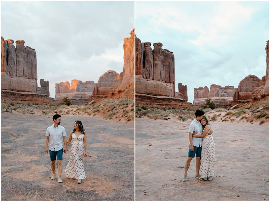 sunrise photoshoot of couple walking hand in hand and embracing on their adventure session in the arches national park