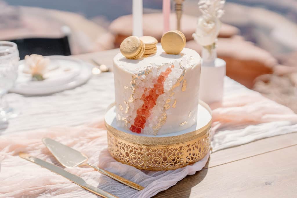 A couple's wedding cake steals the show at their Southern Utah elopement ceremony.