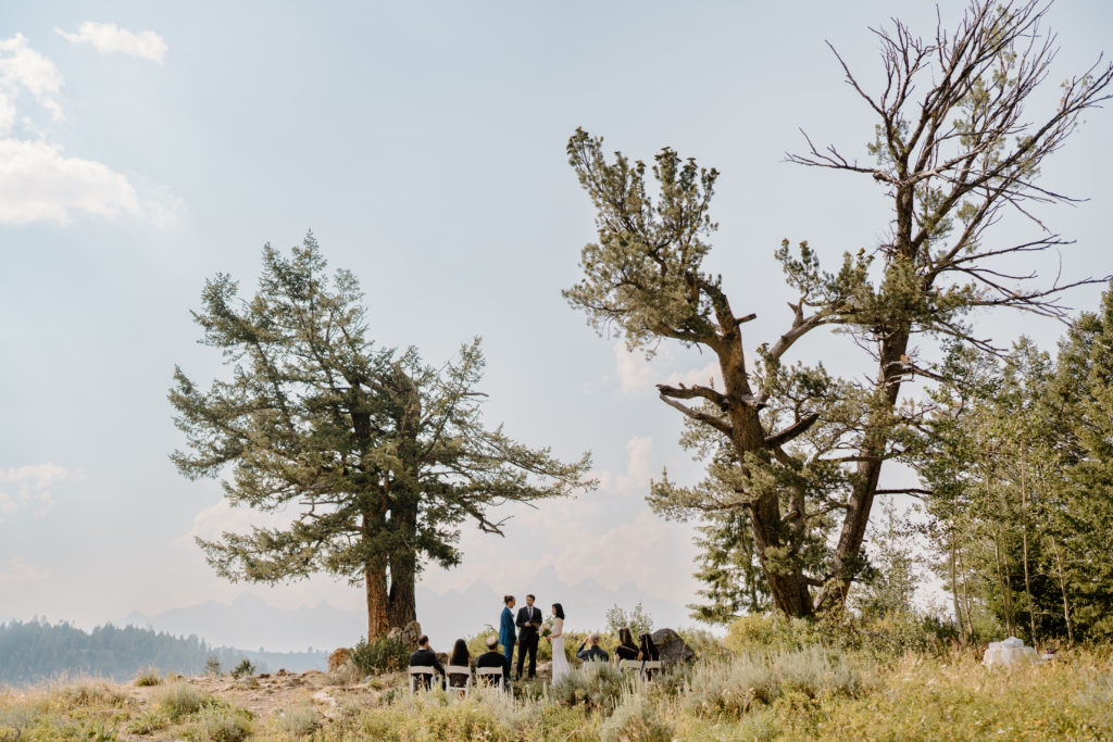 A bride and groom have their elopement ceremony in the Grand Teton National Park elopement ceremony. 
