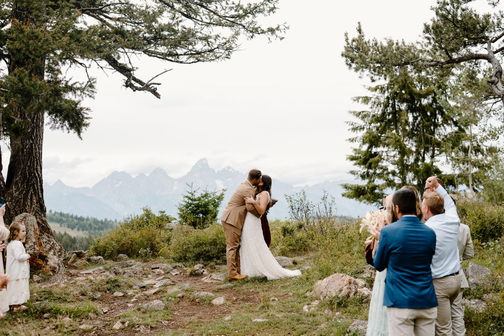 A couple embraces during their ceremony on the first day of their two-day elopement.