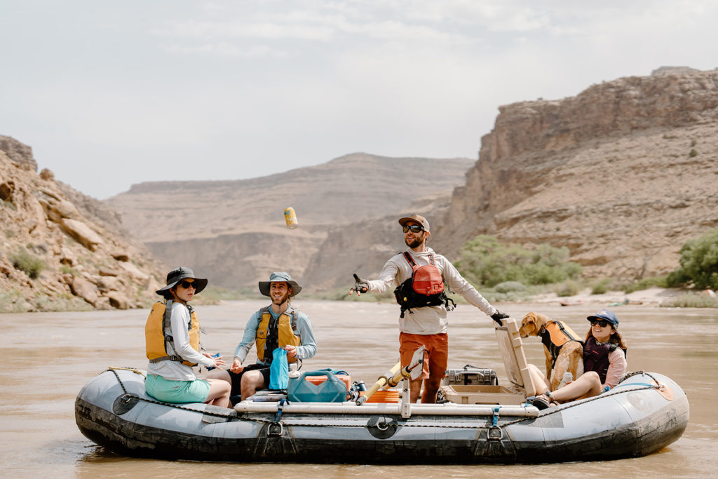 A couple and their friends get ready for their all-day elopement in Moab, Utah. 